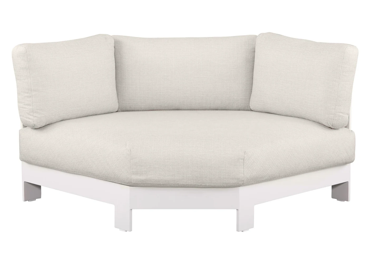 White outdoor lounge set with curved sofa and coffee tables beside a pool