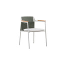 Side view of the AURORA light grey outdoor dining chair with green woven back and teak arms