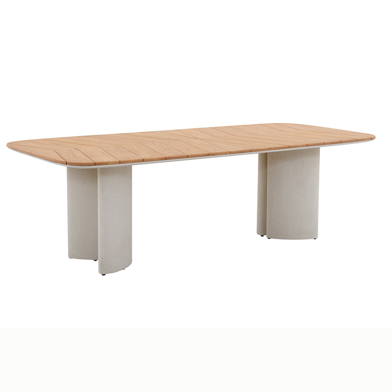 Front view of the AURORA teak outdoor dining table with light-toned sculptural base