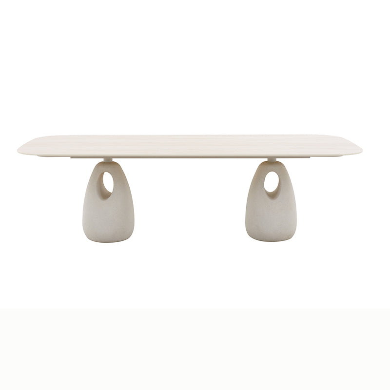 Side view of the BOSSA outdoor dining table with sculptural pedestal bases
