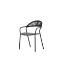 Side view of the FANO black woven outdoor dining armchair