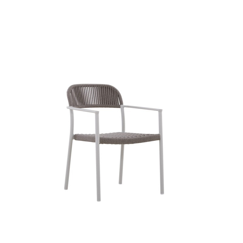 Angled view of the FANO grey rope-woven outdoor dining armchair with white frame