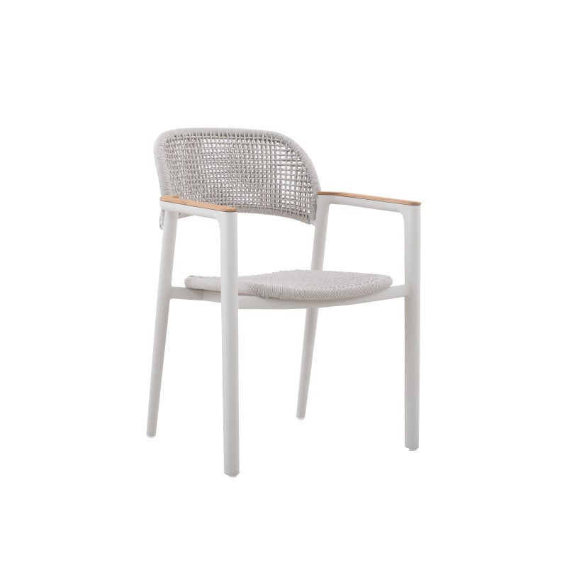 Angled view of the LA TOUR white woven outdoor dining armchair with teak arms