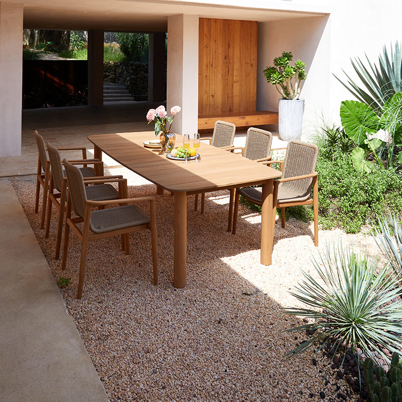 Close-up of a MARINE outdoor dining armchair with woven back and seat