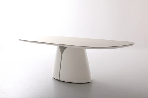 ALMA white outdoor dining table paired with light woven dining armchairs