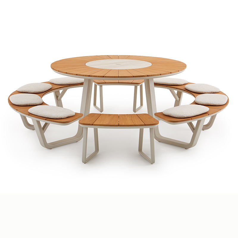 Front view of the ALMA round outdoor dining set with curved bench seating