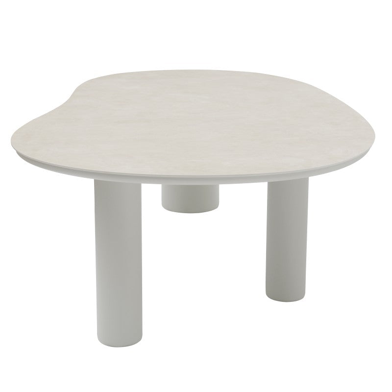 Angled view of the AMICO outdoor table in a light finish