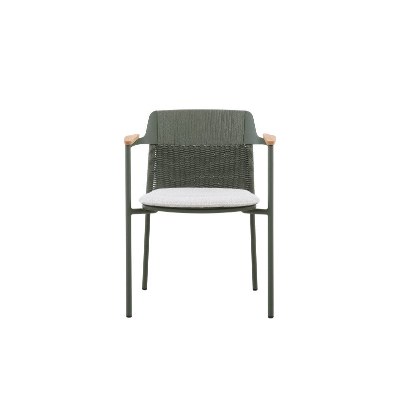 Angled view of the AURORA dark green woven outdoor dining chair with light seat cushion