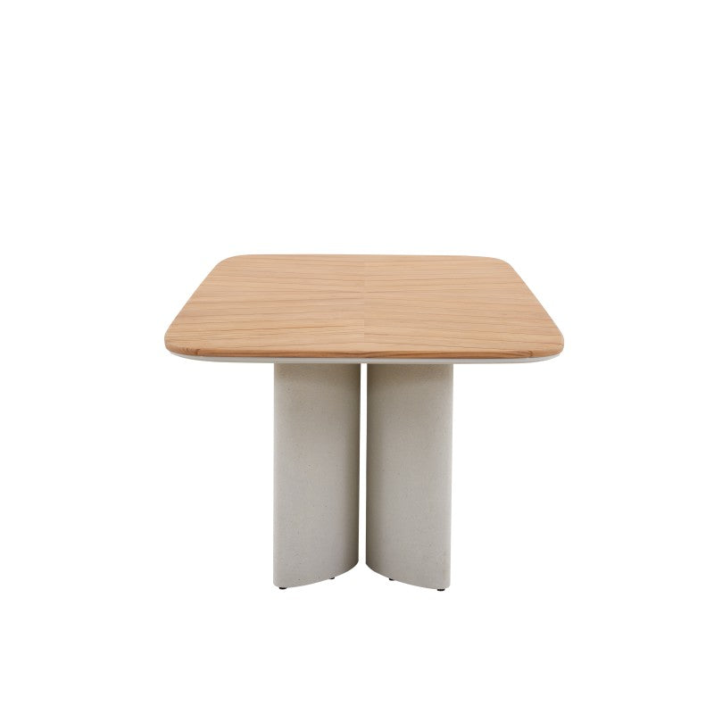 End view of the AURORA teak outdoor dining table with rounded corners