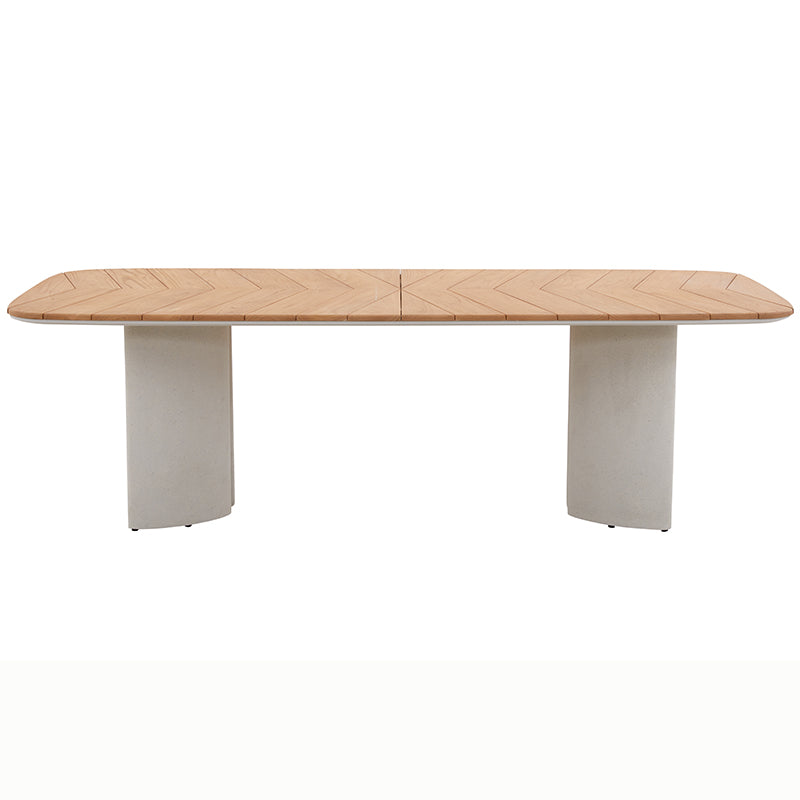 Long view of the AURORA teak outdoor dining table with sculptural base