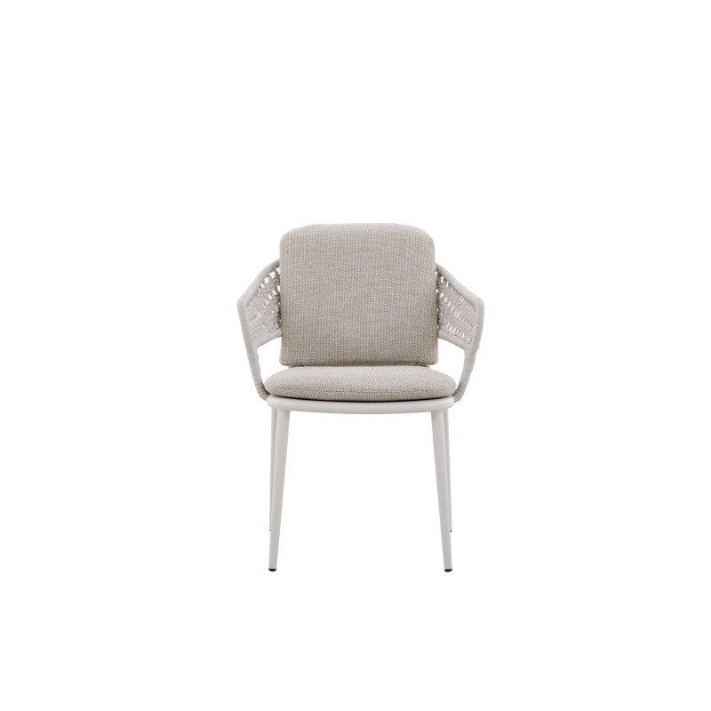 Front view of the BOSSA white woven outdoor dining armchair with light cushions