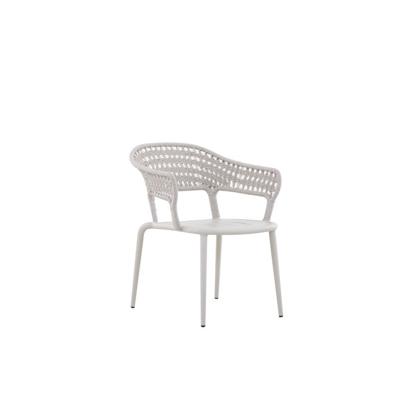 Angled view of the BOSSA white woven outdoor dining armchair