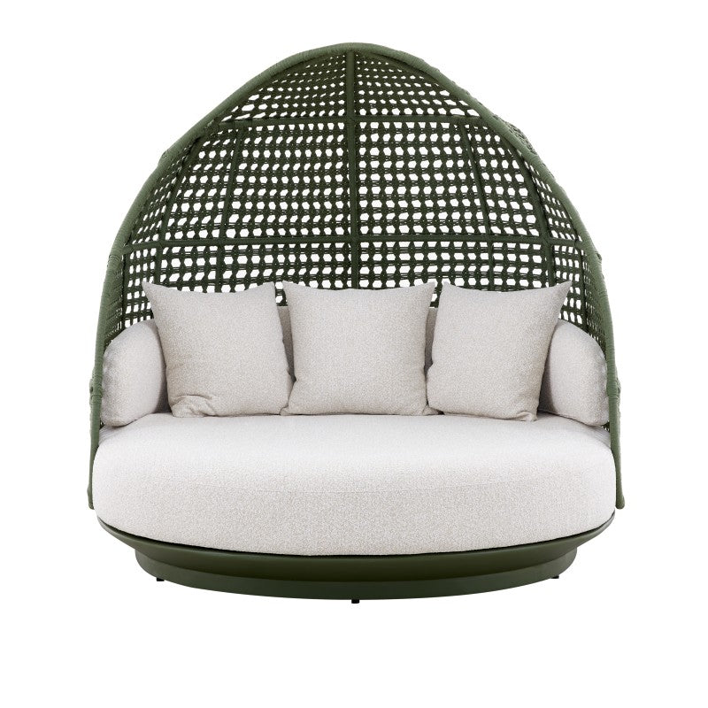 Side view of the BOSSA outdoor cocoon chair with sculptural woven shell