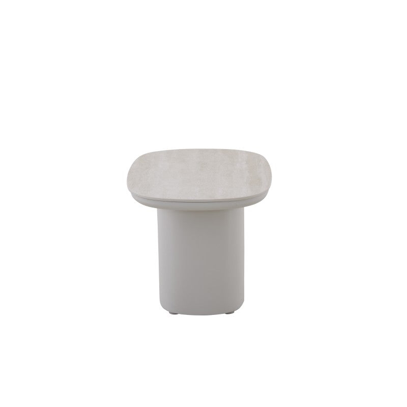 Front view of the COCOON outdoor side table in a light neutral finish