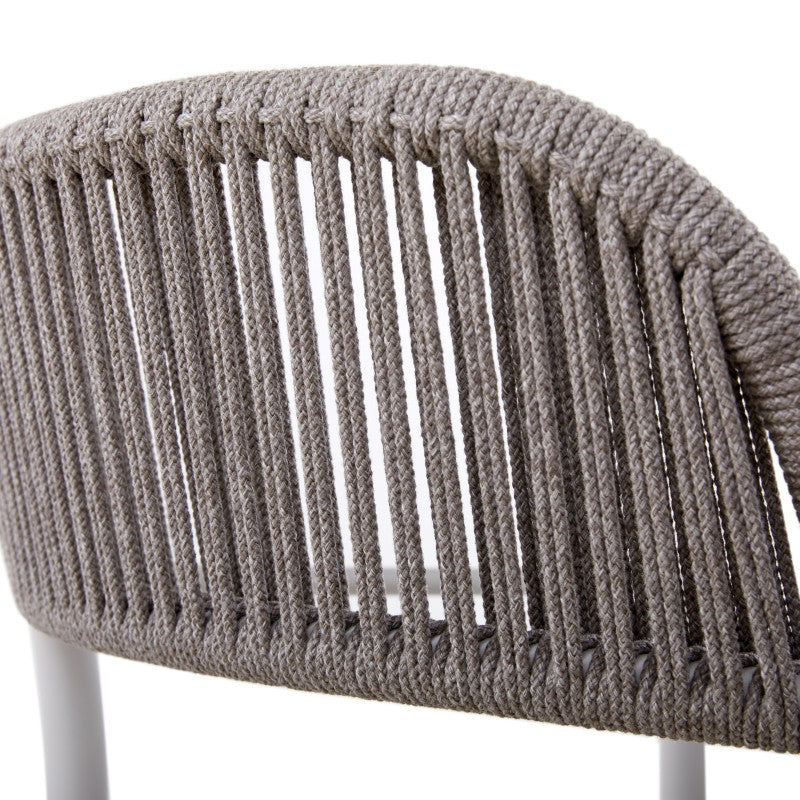Close detail of the FANO grey rope-woven backrest and white frame