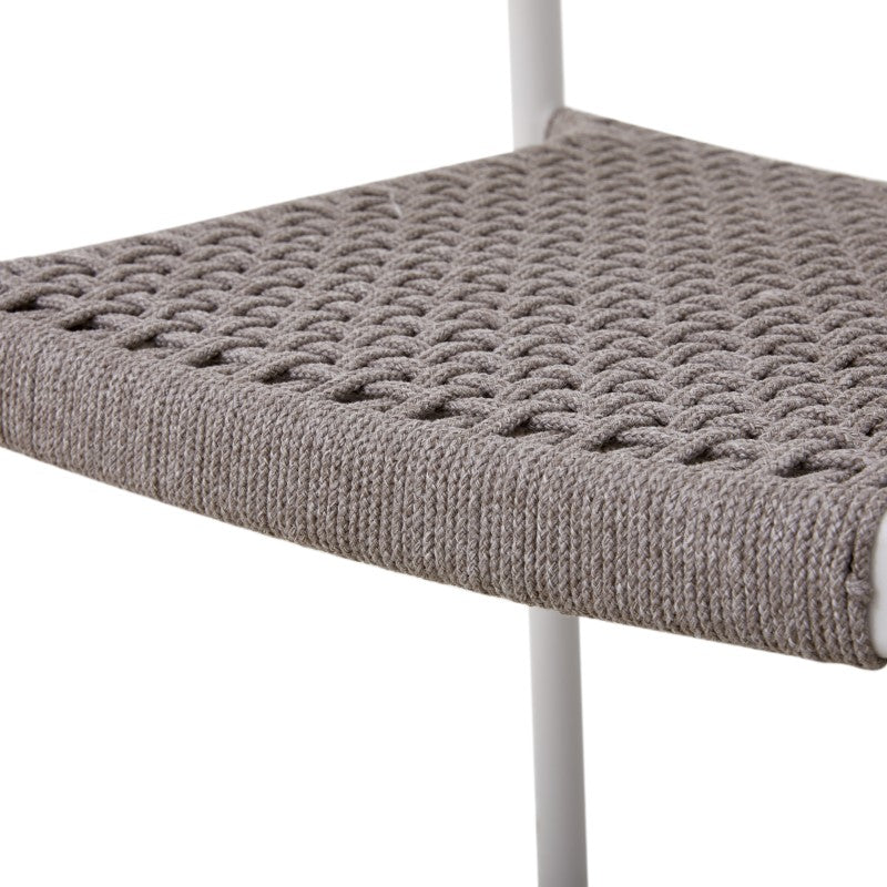 Close detail of the FANO grey rope-woven seat and white frame
