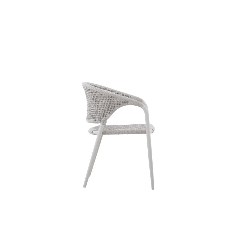 Side view of the LA TOUR white woven outdoor dining armchair