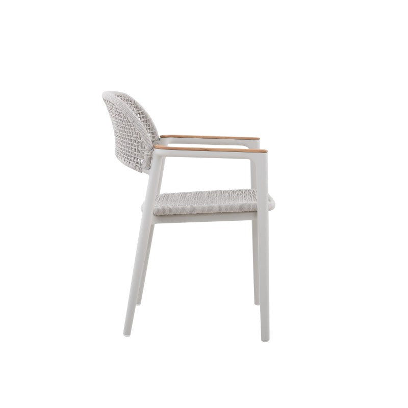 Side view of the LA TOUR white woven outdoor dining armchair with teak arm caps