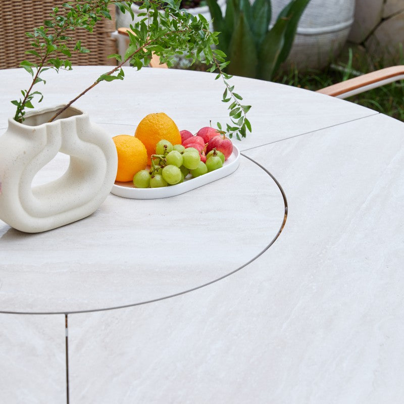 Close-up of the LOOP outdoor dining table rounded surface and central detail
