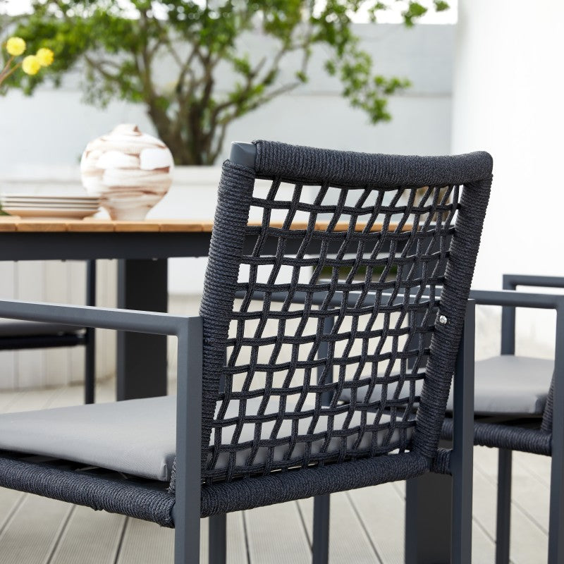 Close detail of the SUNRISE black rope-woven outdoor dining armchair rope texture