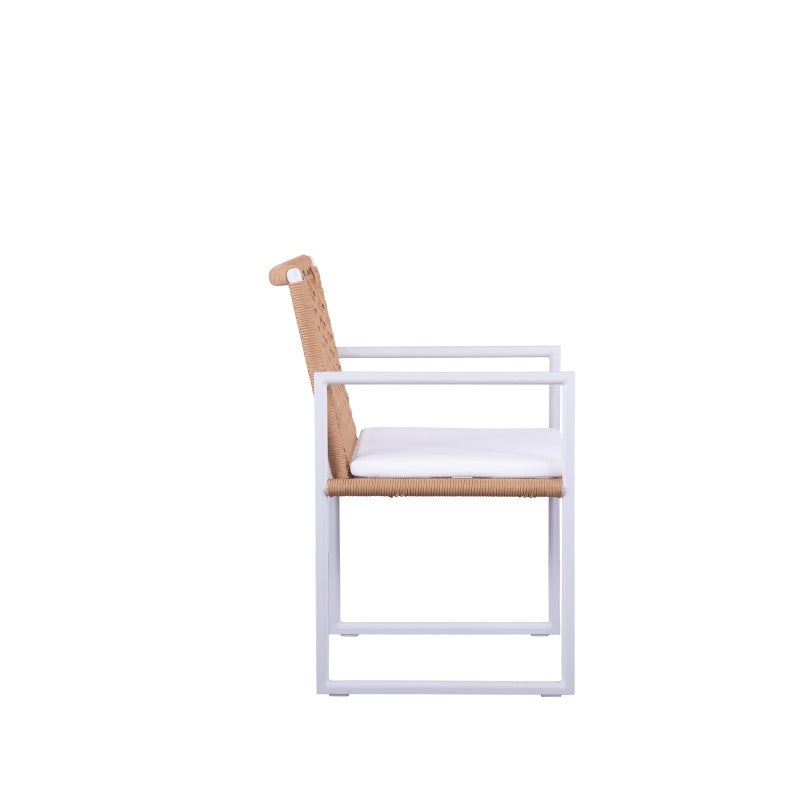 SUNRISE natural rope-woven outdoor dining armchairs arranged around a white outdoor table