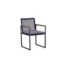 Angled view of the SUNRISE black rope-woven outdoor dining armchair with teak arms